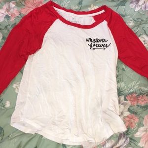 Baseball style shirt.